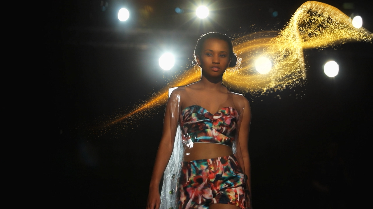 Particle Eagle flying around fashion model on runway