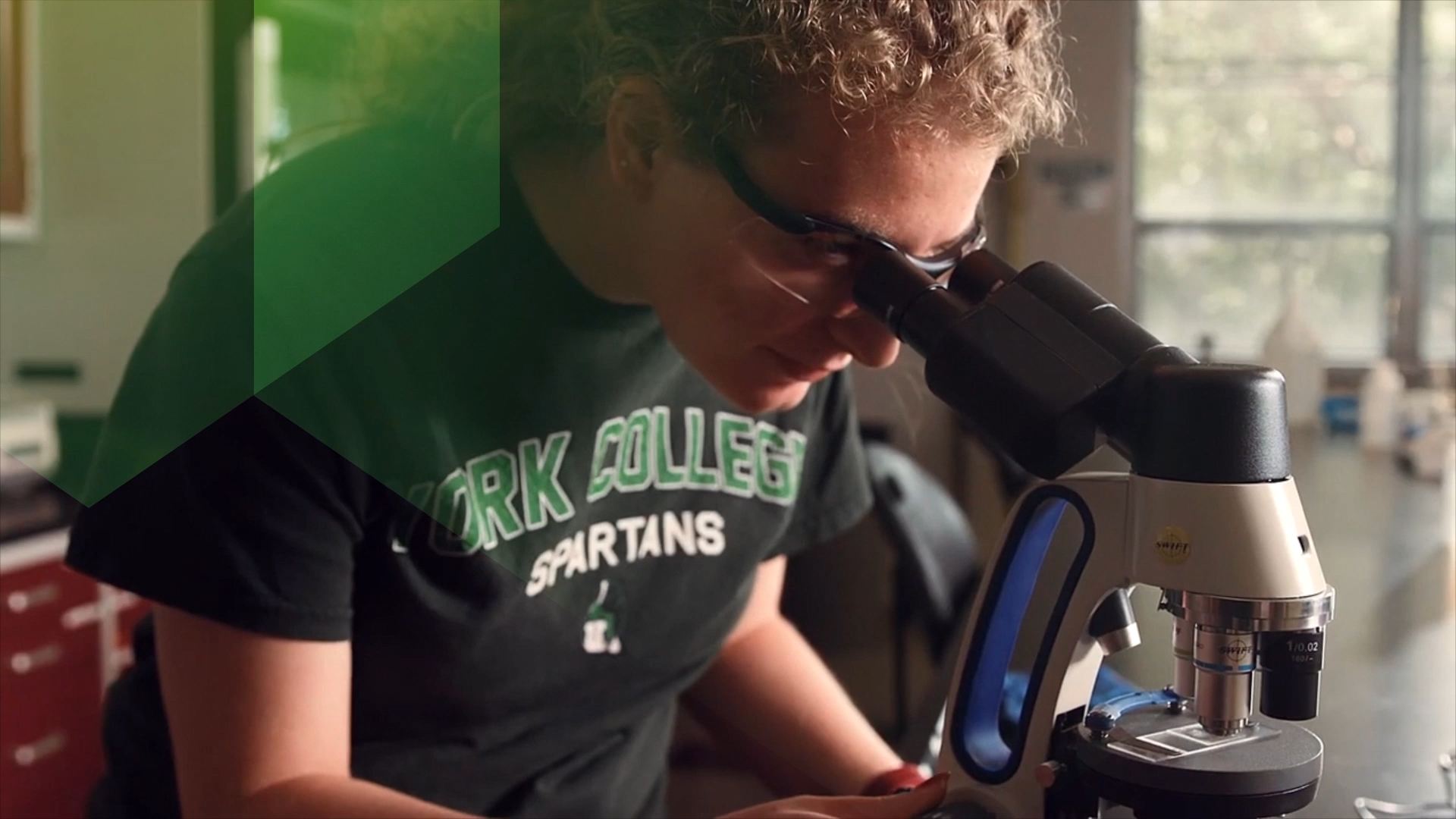 Footage of Student using microscope at York College